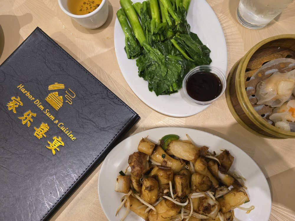 various dim sum dishes on a table