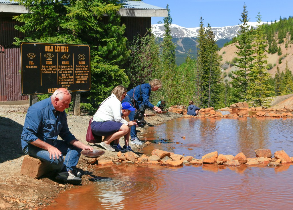 People panning for gold in Eureka Creek outside of the Country Boy Mine