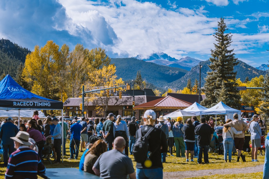 Outdoor tents and crowds of people at Elk Fest in Estes Park