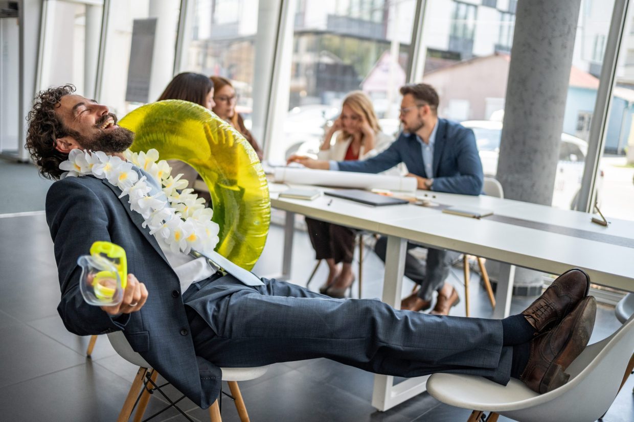 man laughing at work