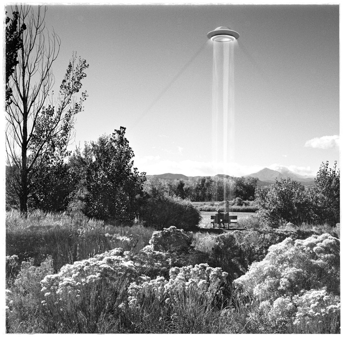 A photo of a UFO abduction outside