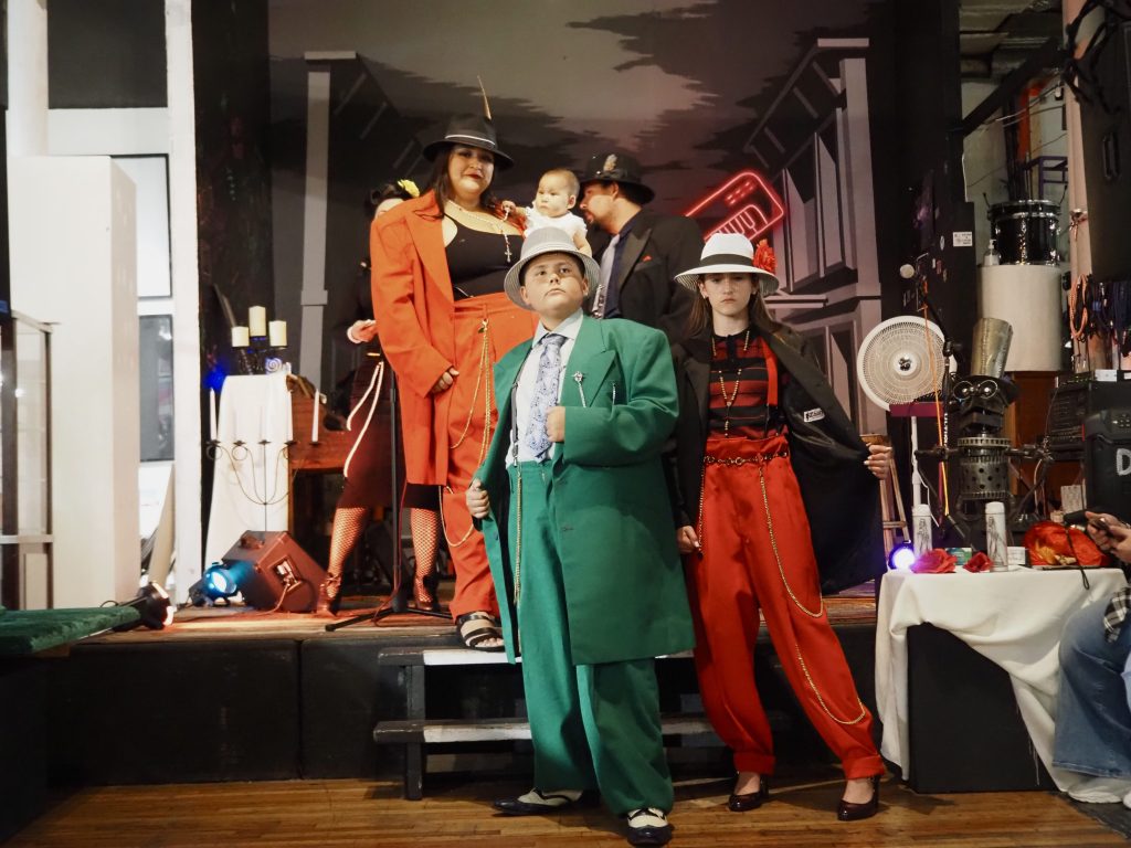 A family dressed in zoot suits