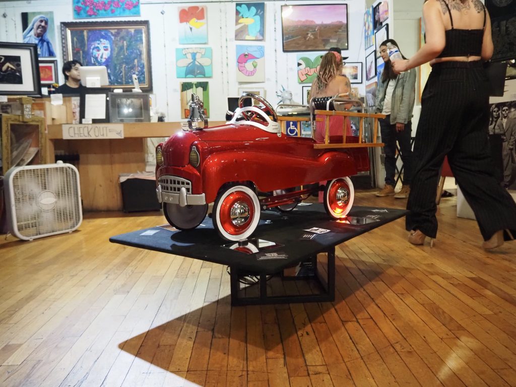 A model of a red lowrider car