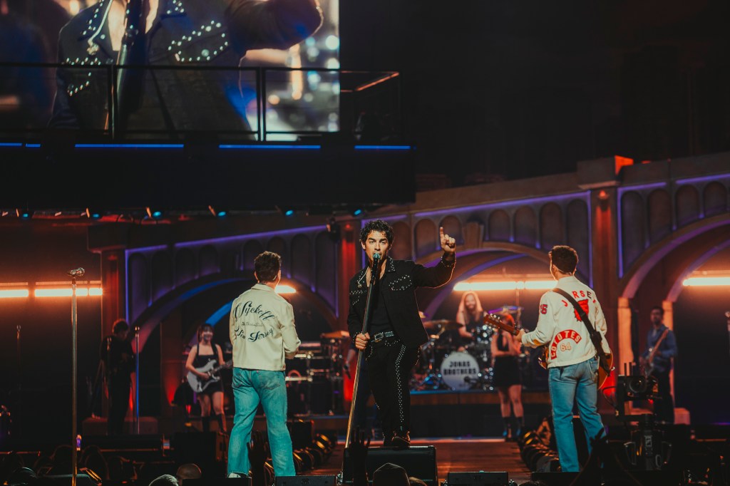 The Jonas Brothers on stage at Ball Arena in Denver, Colorado, for their JONAS20 Greetings From Your Hometown tour.