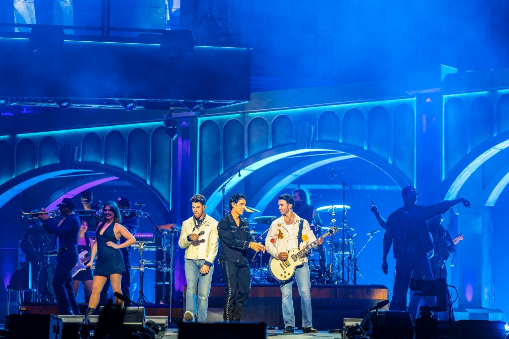 The Jonas Brothers on stage at Ball Arena in Denver, Colorado, for their JONAS20 Greetings From Your Hometown tour.
