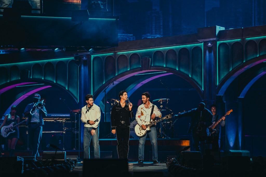 The Jonas Brothers on stage at Ball Arena in Denver, Colorado, for their JONAS20 Greetings From Your Hometown tour.