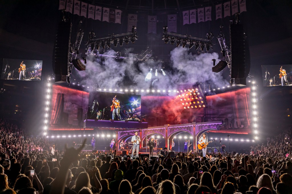 The Jonas Brothers on stage at Ball Arena in Denver, Colorado, for their JONAS20 Greetings From Your Hometown tour.