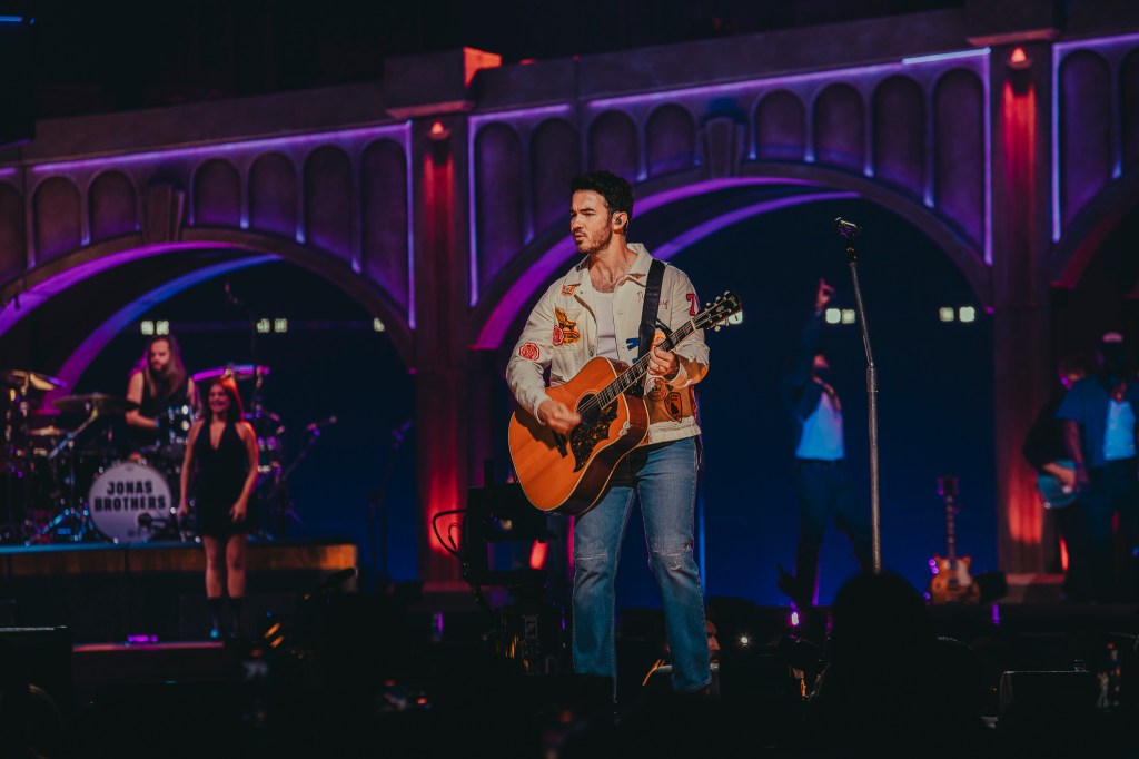 The Jonas Brothers on stage at Ball Arena in Denver, Colorado, for their JONAS20 Greetings From Your Hometown tour.