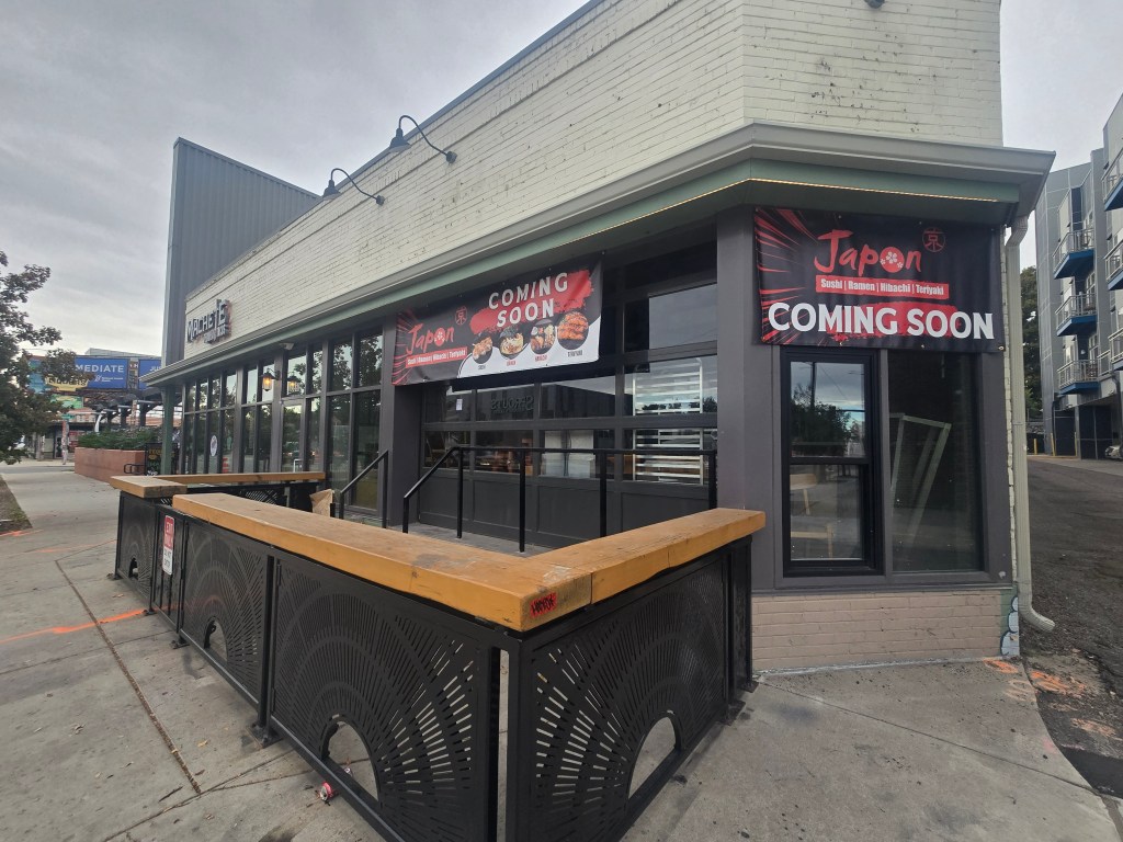 "coming soon" banner on a building