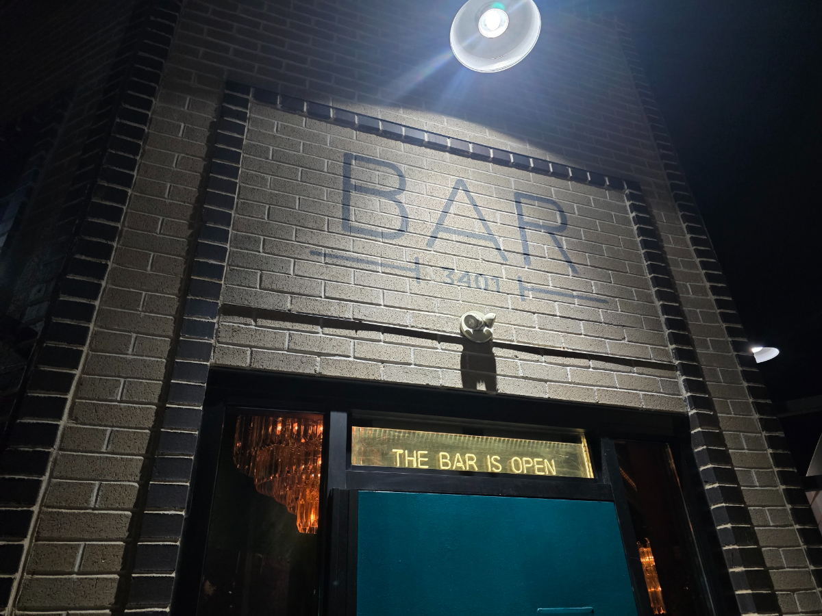 brick building with "bar" over the entrance