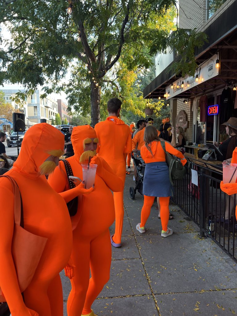 people dressed as the lorax drinking drinks