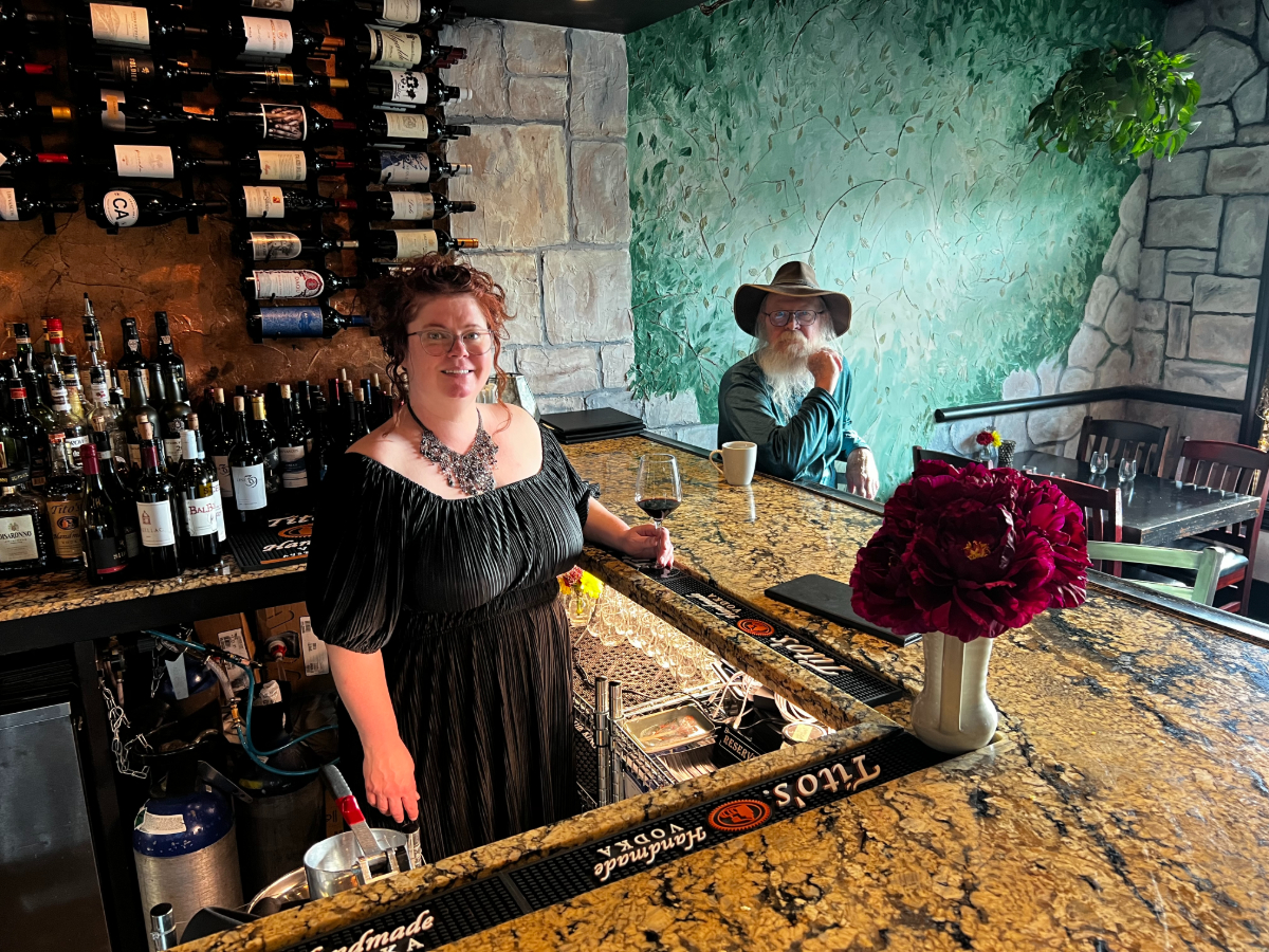 man and woman at a bar