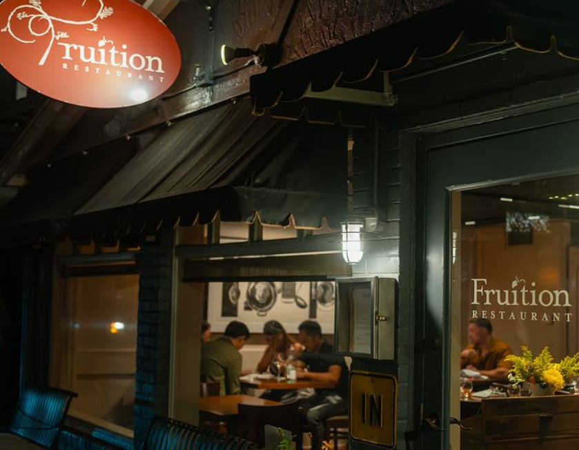 view of a restaurant dining room through a window