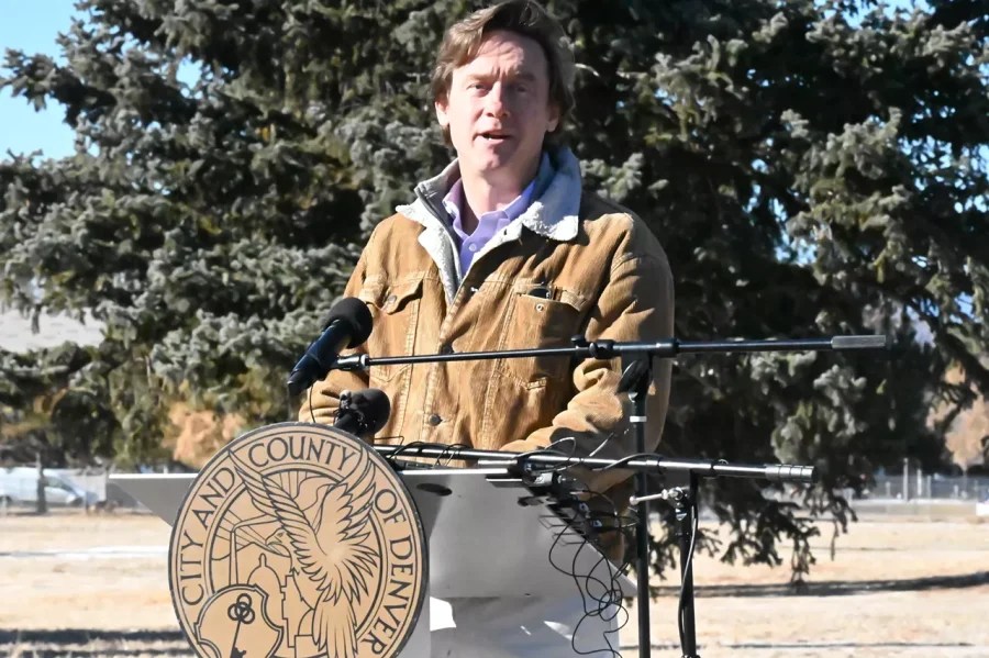 denver mayor speaks at podium