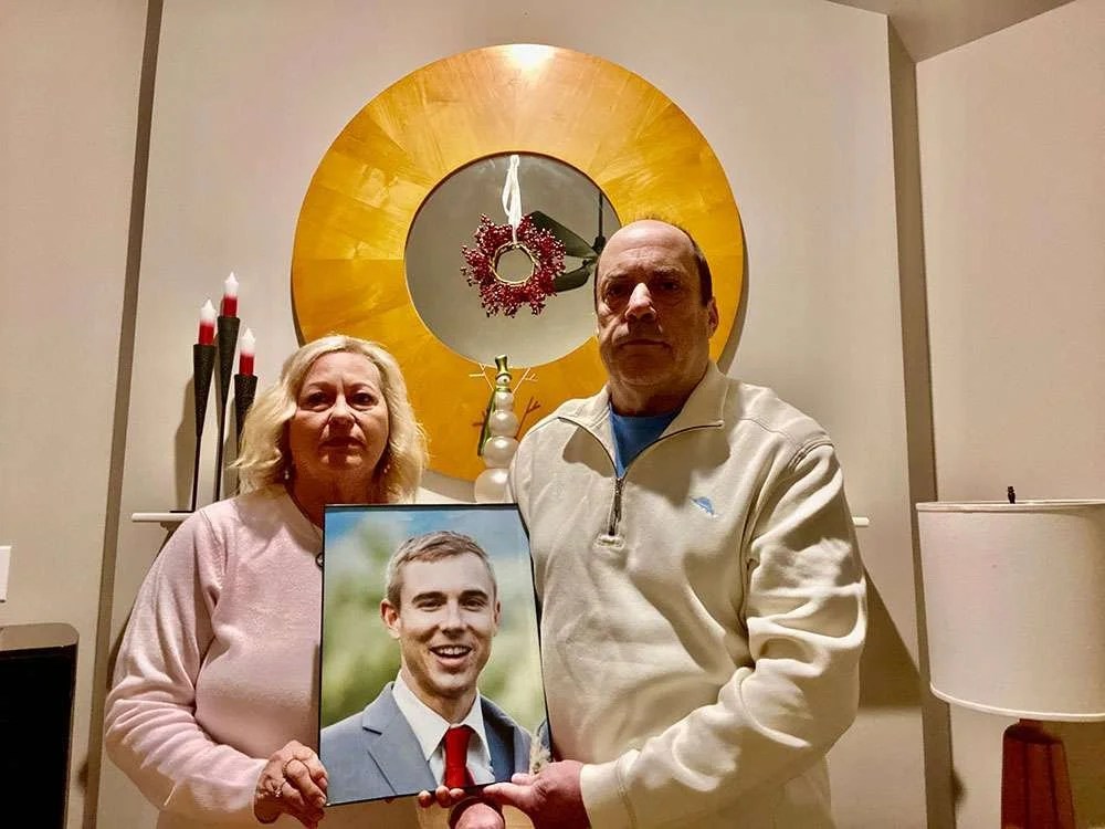 man and woman with picture