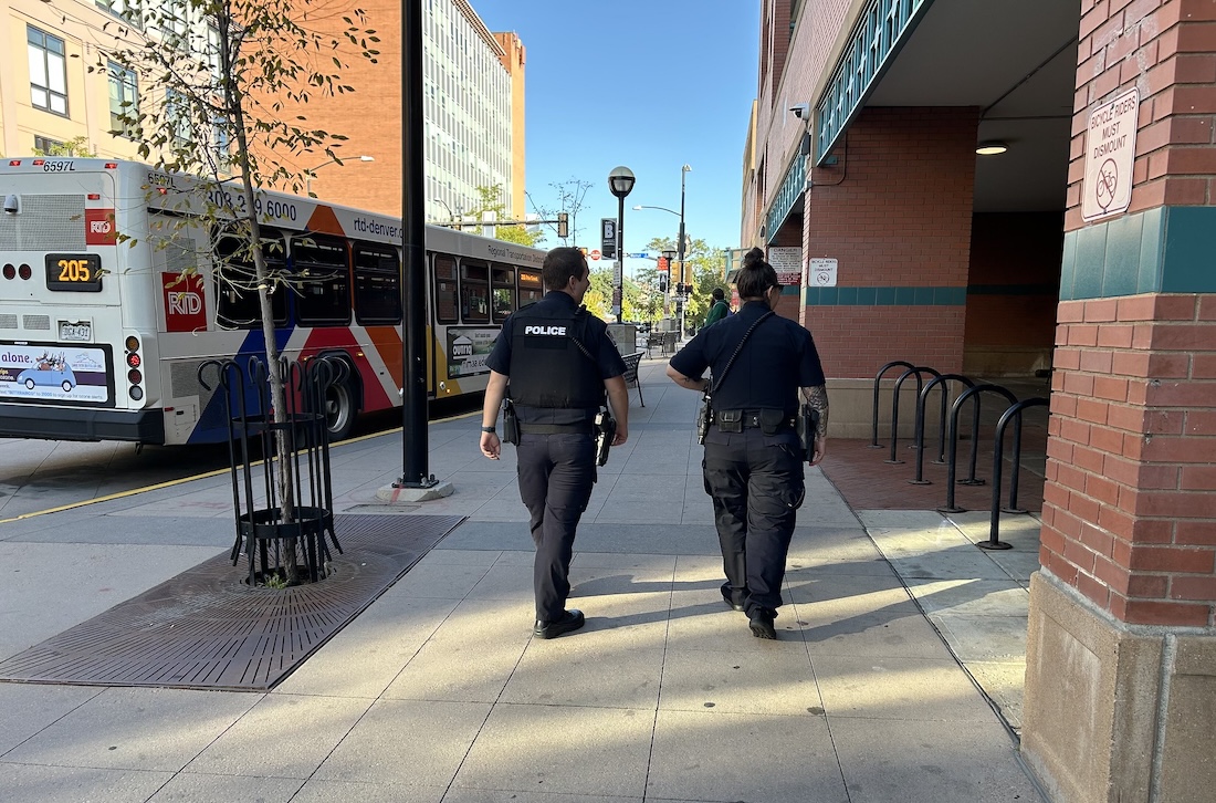 RTD police officers approach a bus