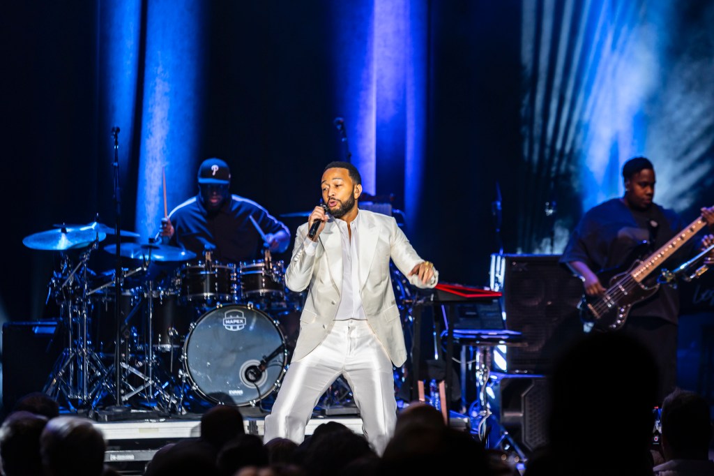 John Legend performing on stage at the Paramount Theatre on Wednesday, November 19.