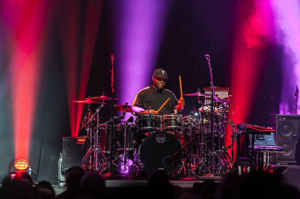 John Legend's band performing on stage at the Paramount Theatre on Wednesday, November 19.