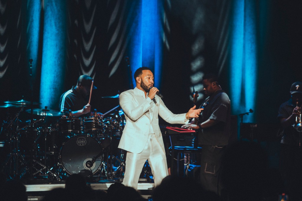 John Legend performing on stage at the Paramount Theatre on Wednesday, November 19.