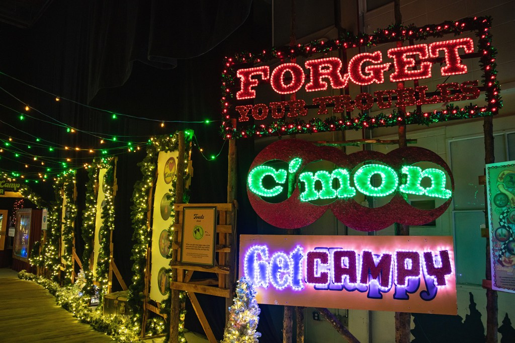 "Forget your troubles; c'mon, get campy" sign.