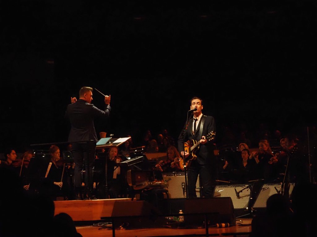 Andrew Bird performs with an orchestra