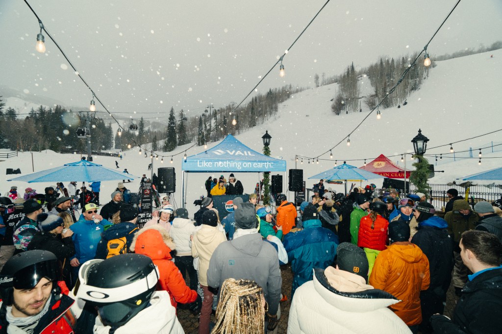 Crowds surrounding a performing DJ at Vail Mountain