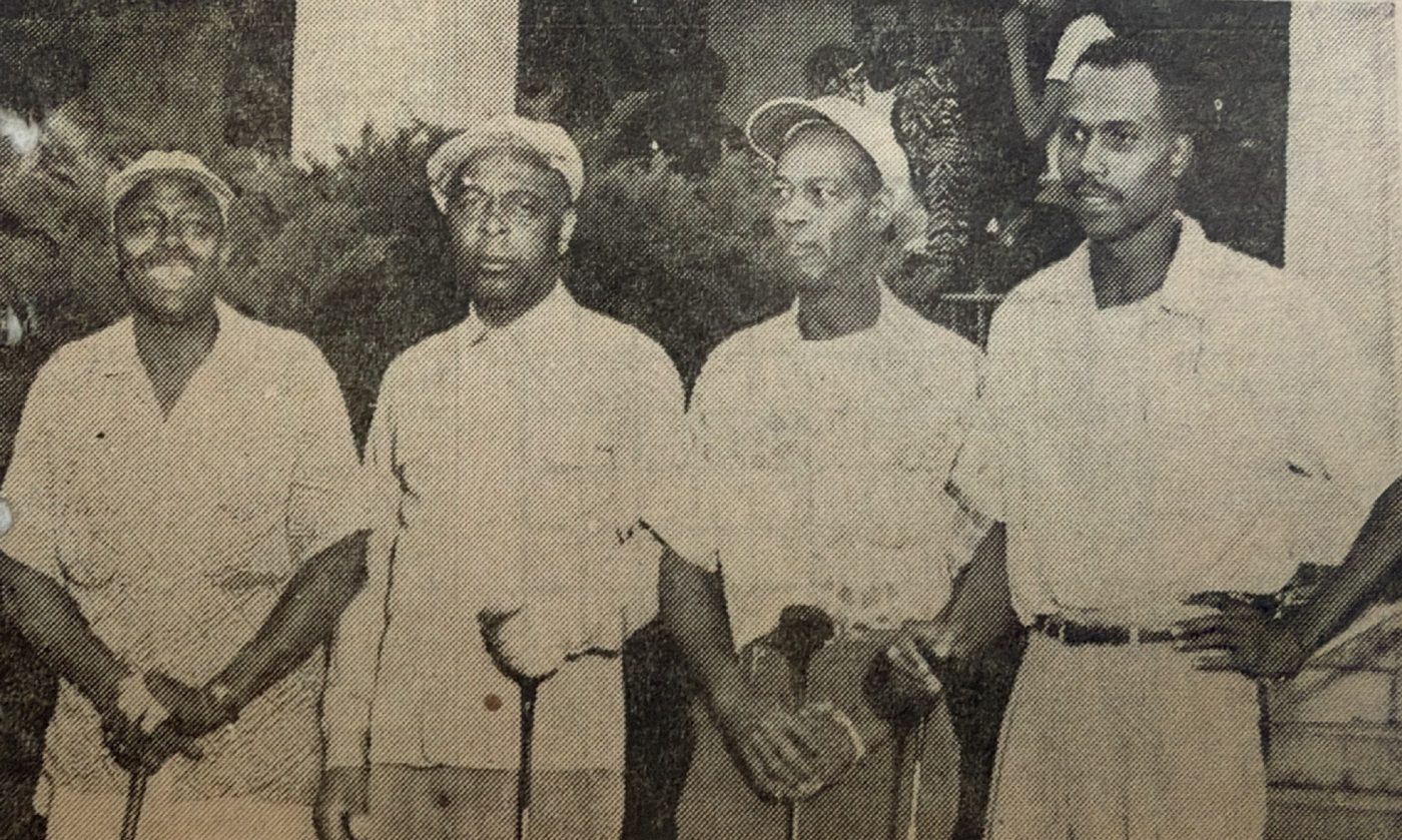 U.S. Olympian Jerome Biffle and his friends pose for a golf photo