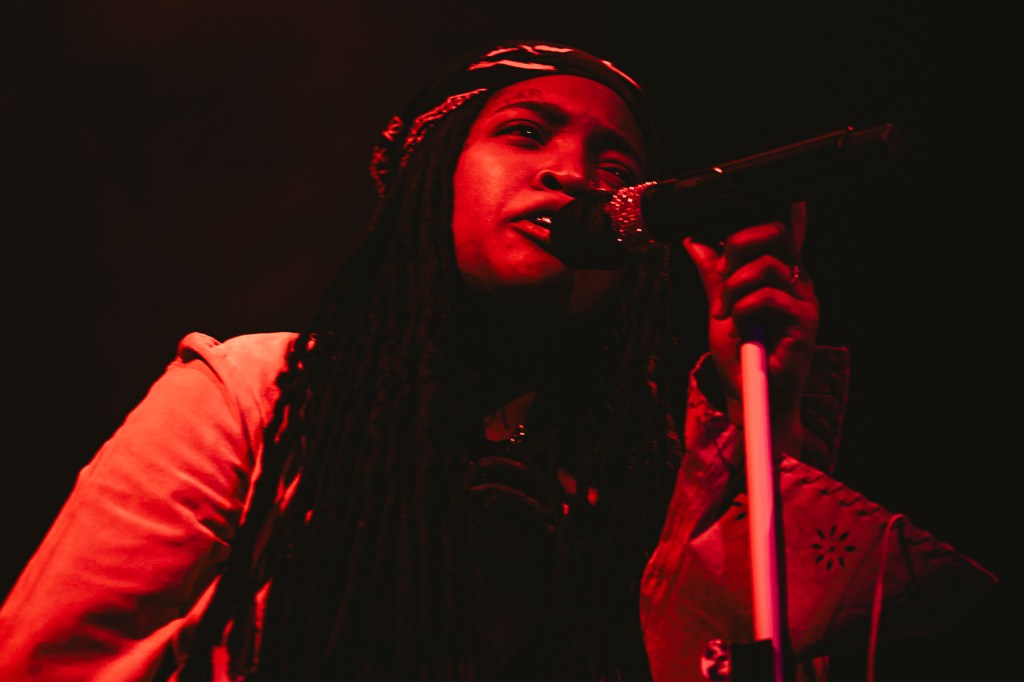 Ambré on stage at the Summit Music Hall in Denver, Colorado.