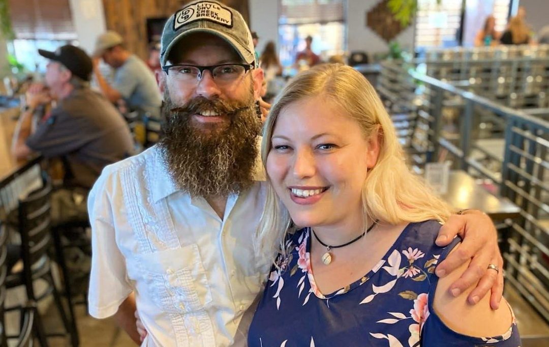 man and woman posing