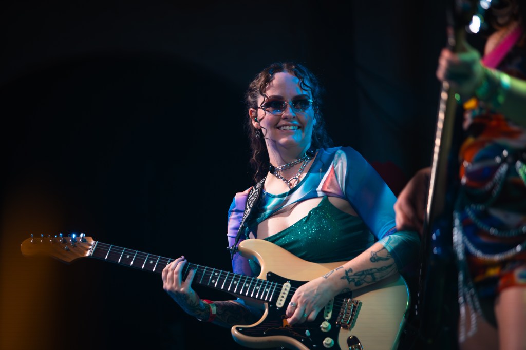 guitarist smiling on stage