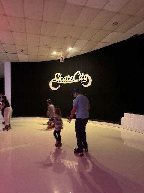 People skate at Skate City