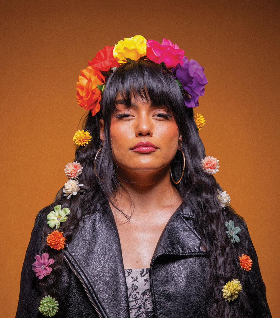 woman in leather and flowers