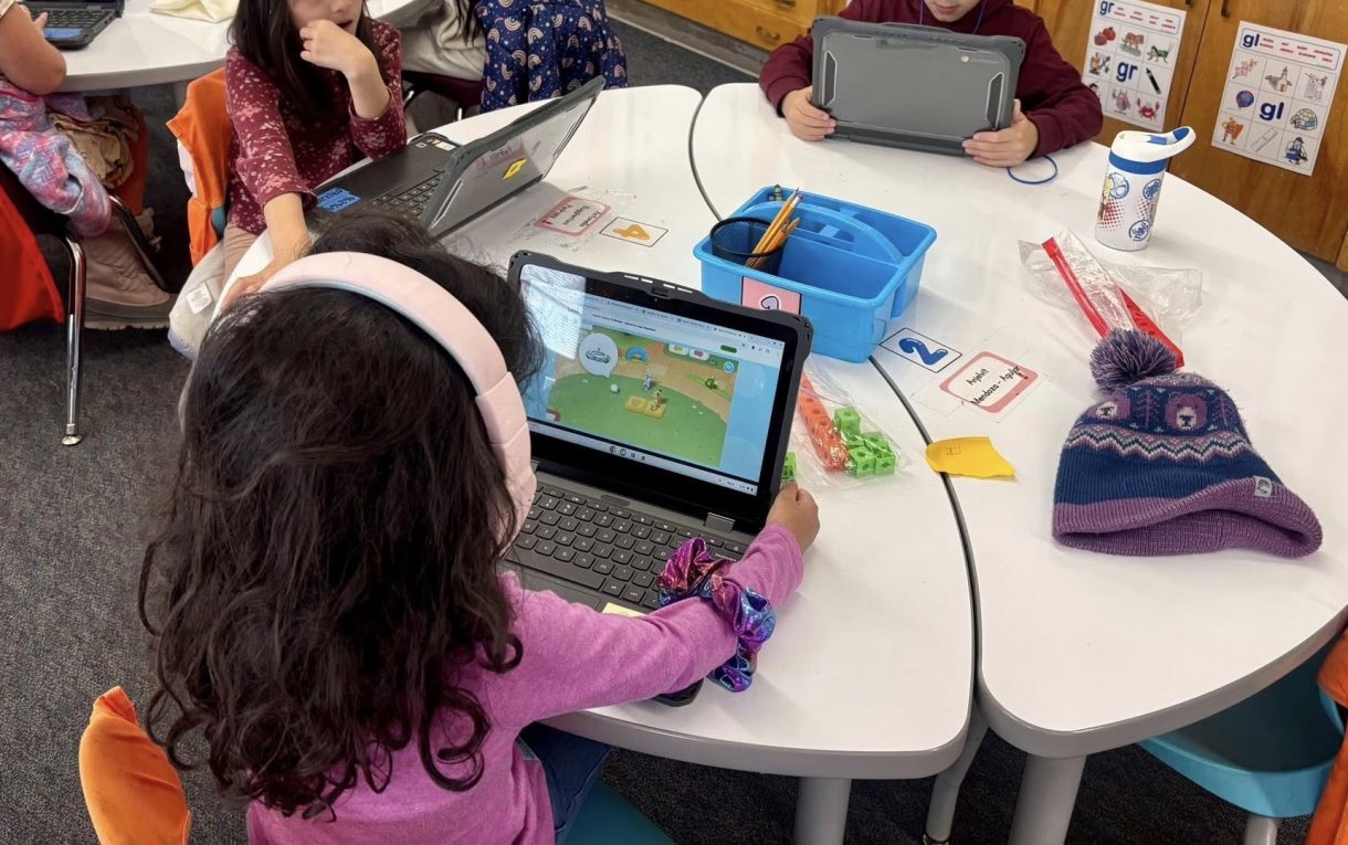 denver public school students work on tablet in classroom