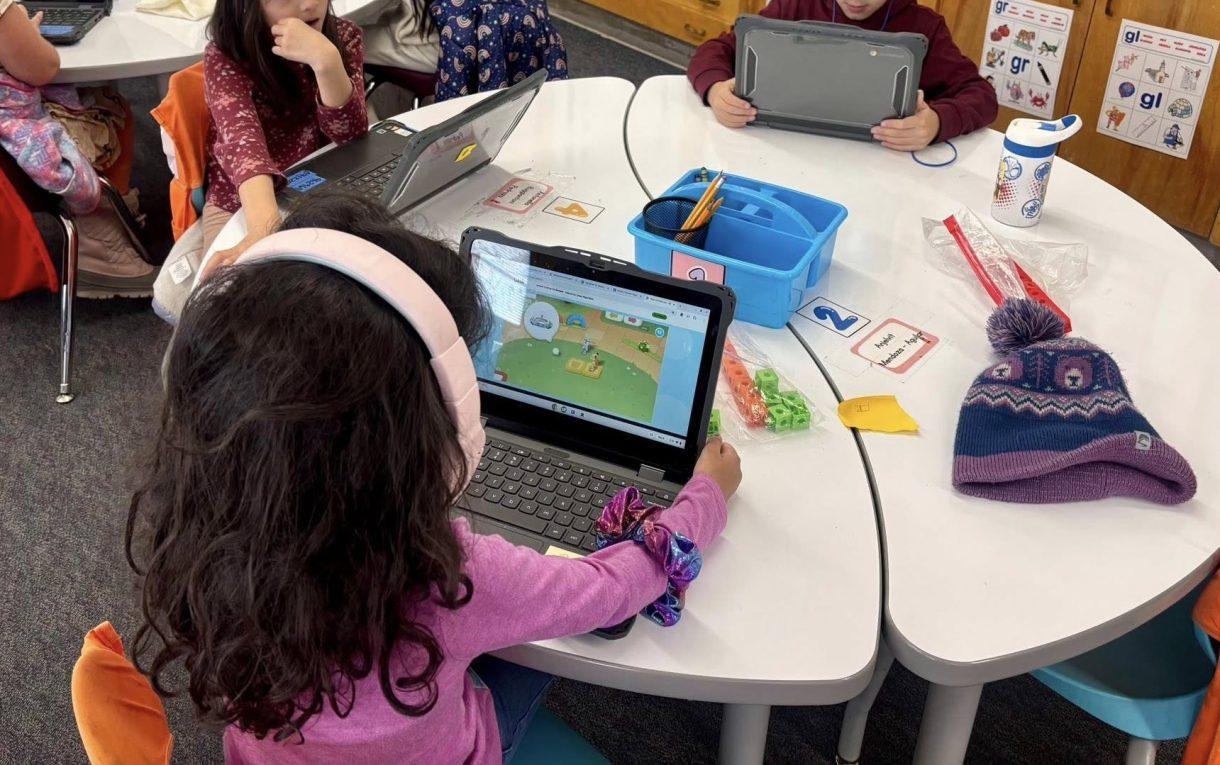 denver public school students work on tablet in classroom