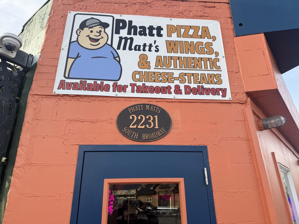 "Phatt Matt's" sign above a doorway