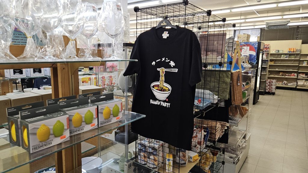 Shirts and supplies on display at a store