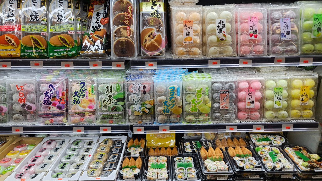 Japanese pastries, mochi and sushi on store shelves