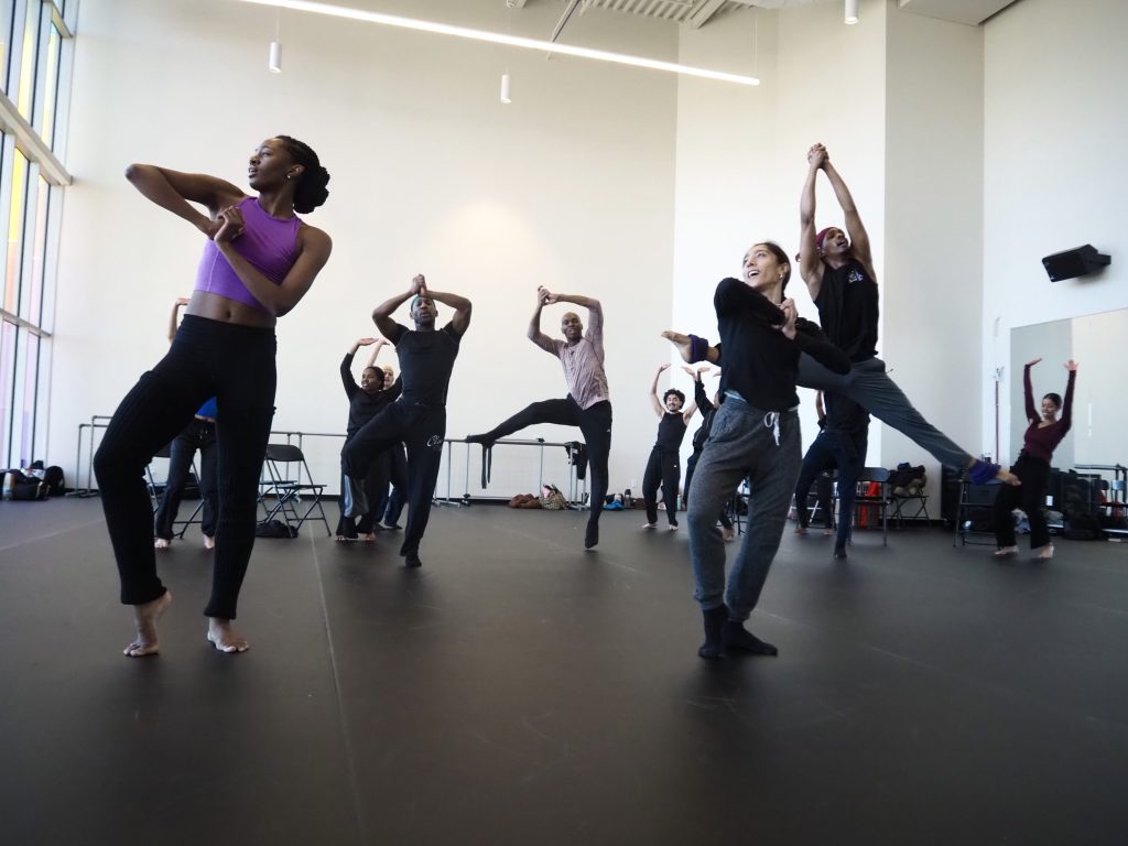 dancers dance in a studio