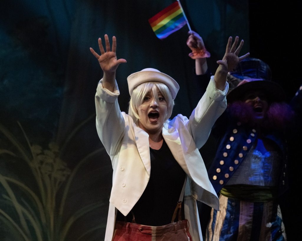 The ensemble of Shrek the Musical performs "Freak Flag" with Pride flags