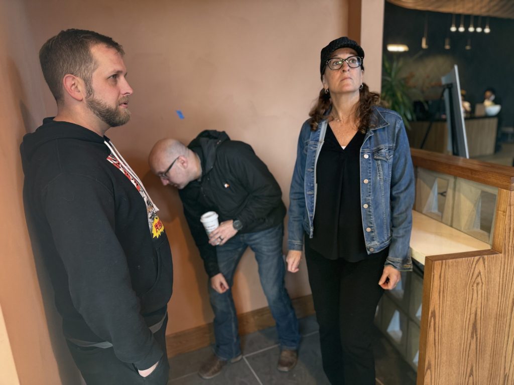 people looking at walls