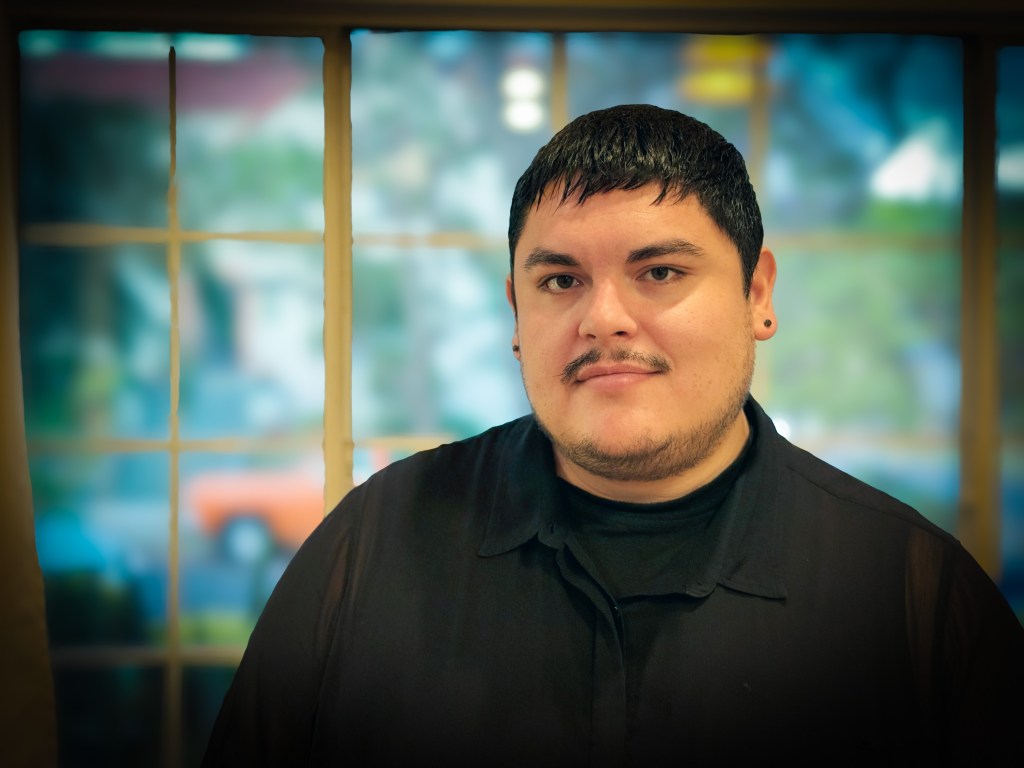 Headshot of a playwright