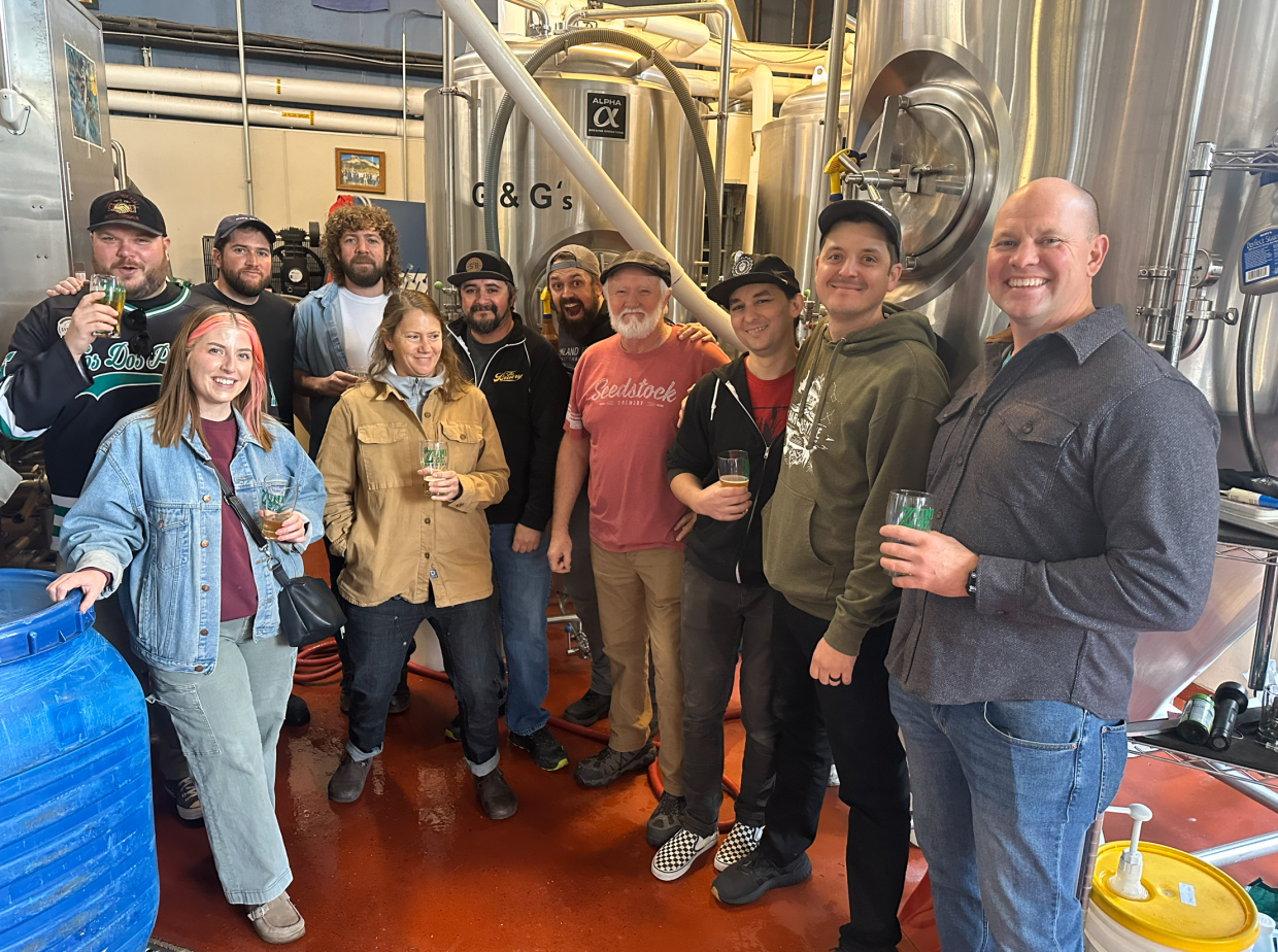 group of people in a brewery