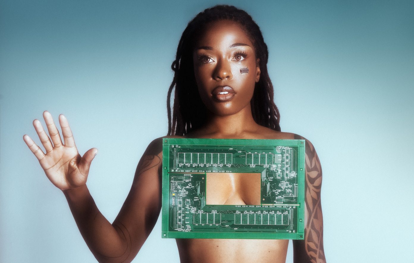 woman with her hand held up