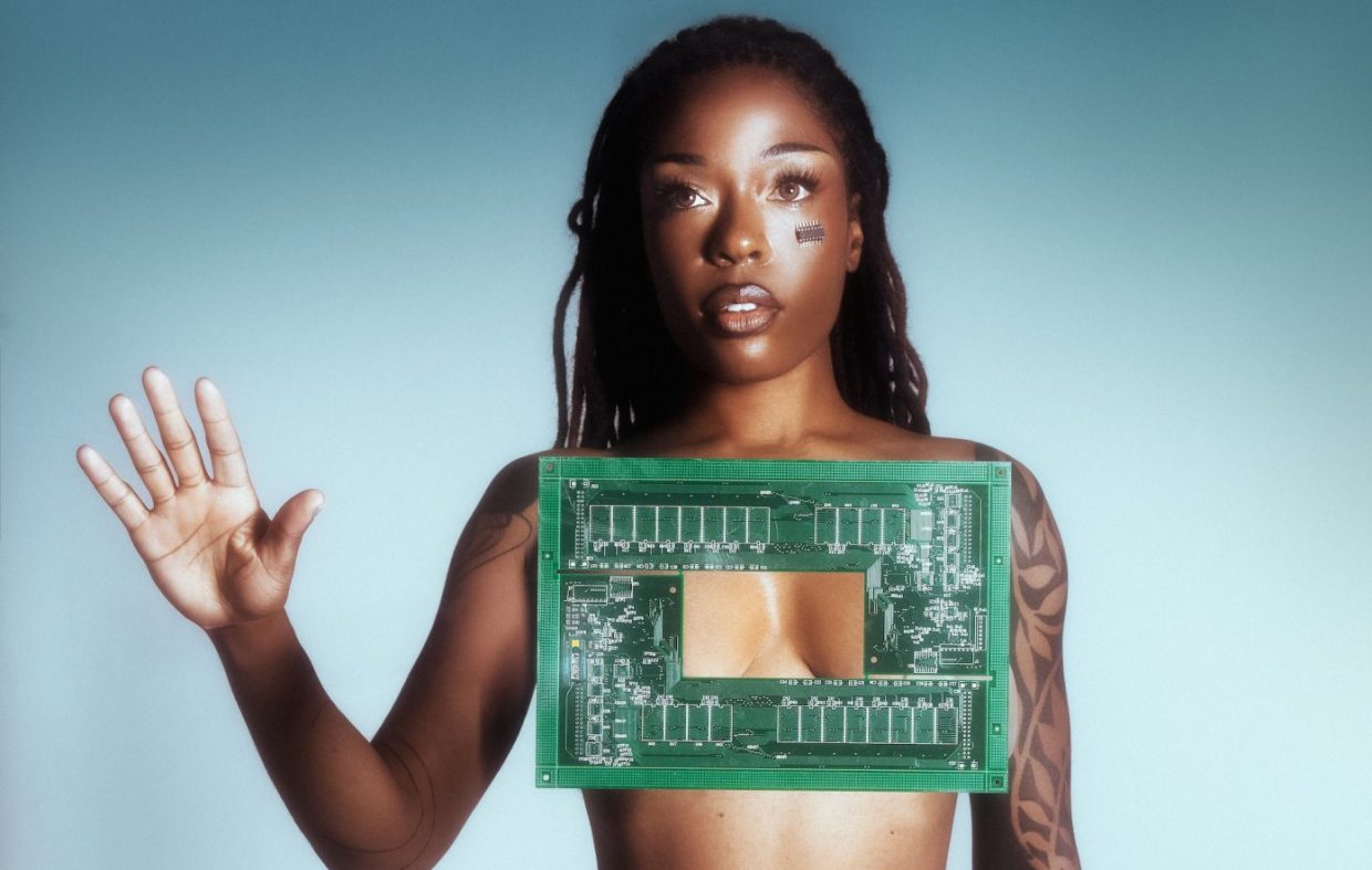 woman with her hand held up