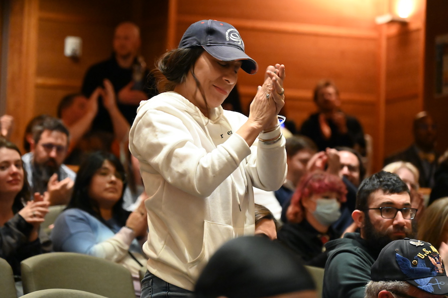 people clap at council meeting