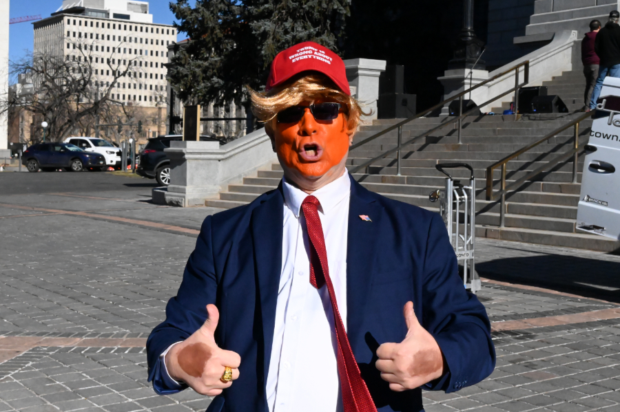 man dressed up as trump with orange face