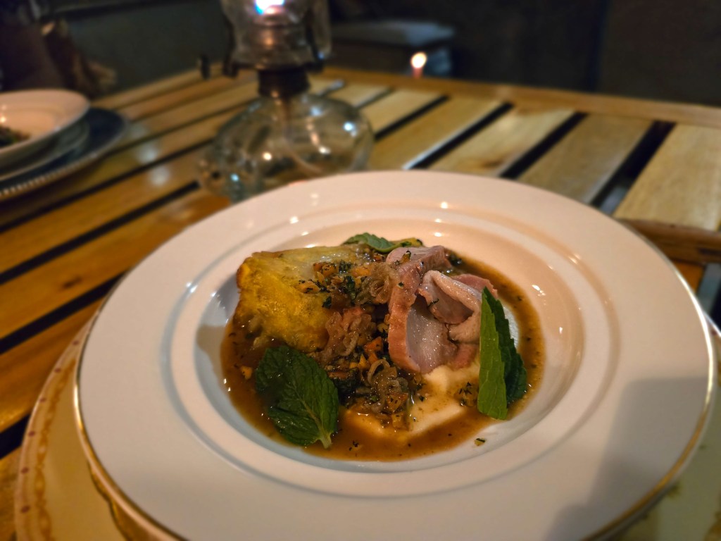 pork dish on a white plate