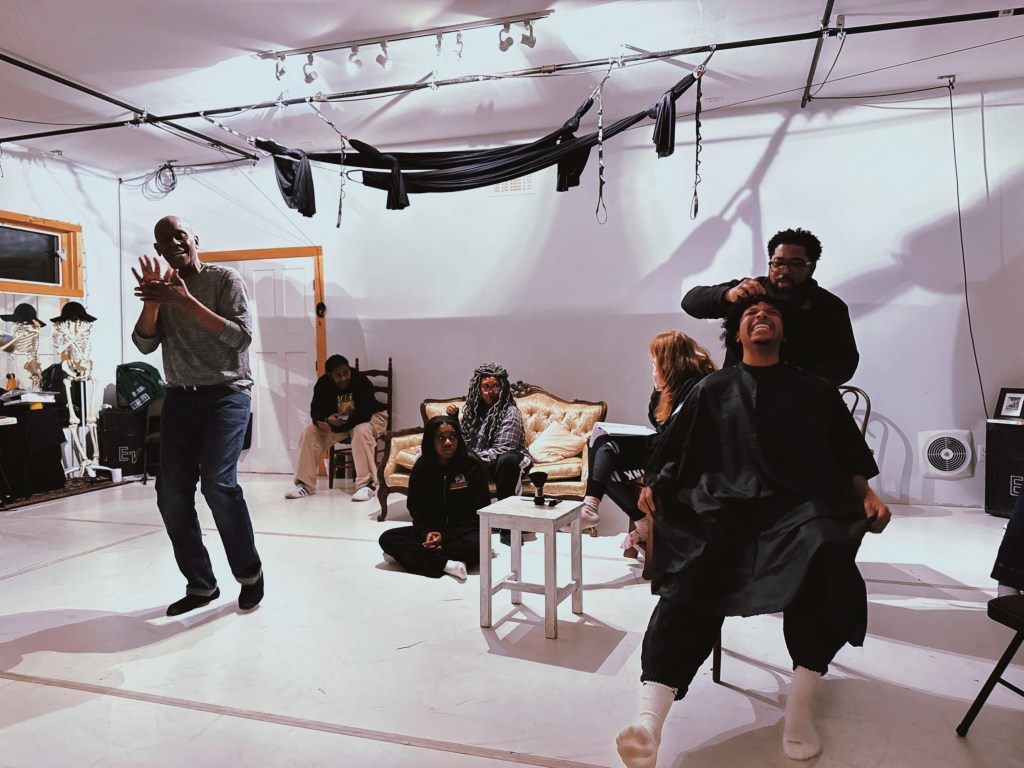 Actors rehearse a play