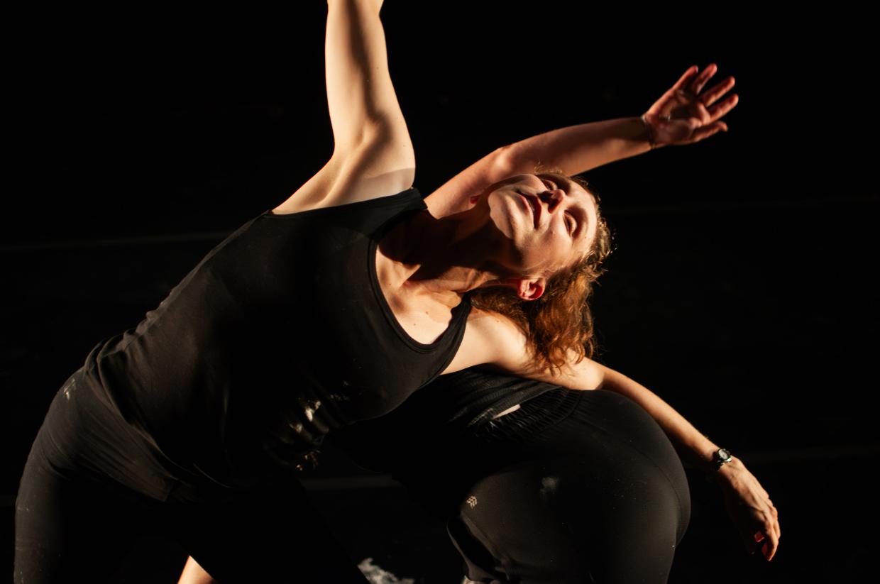 Two woman dance