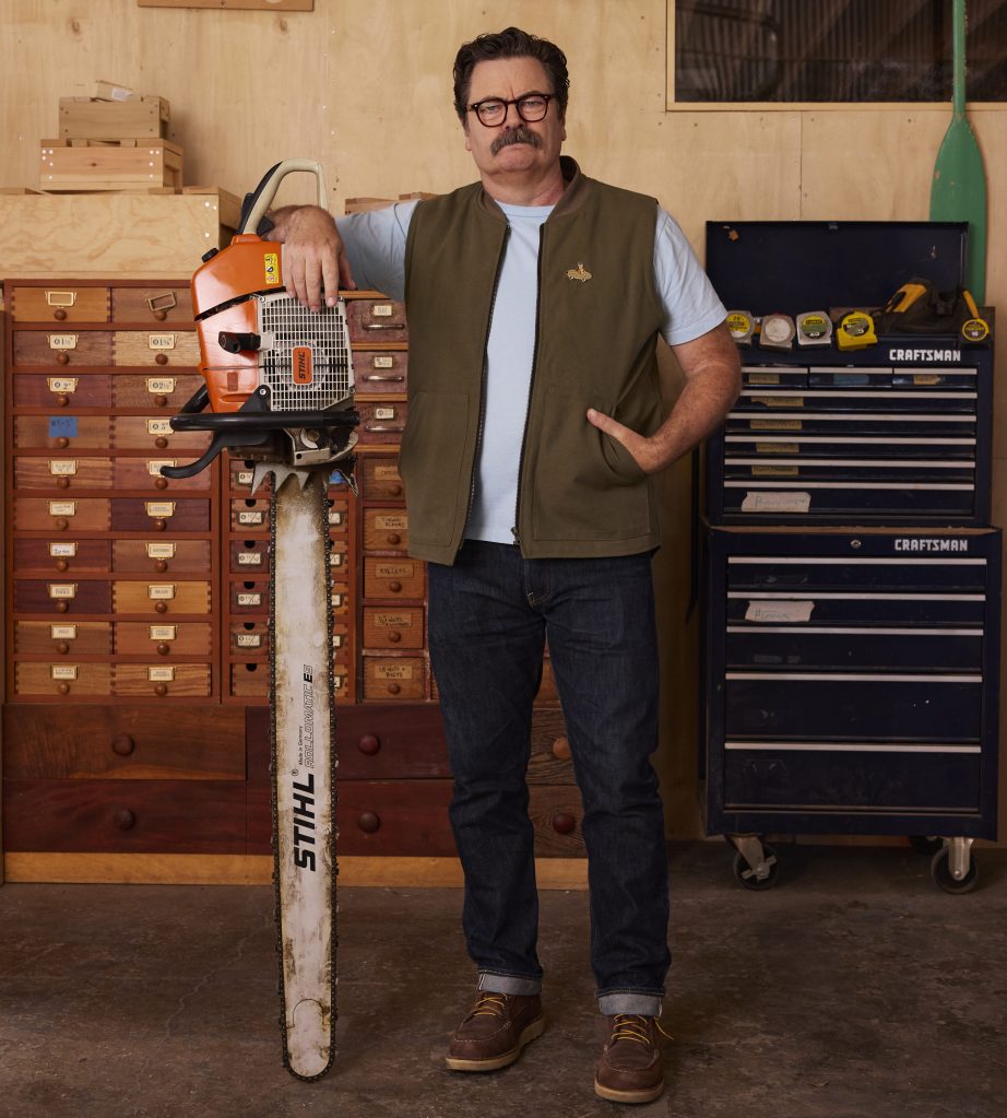 Man poses with a tool